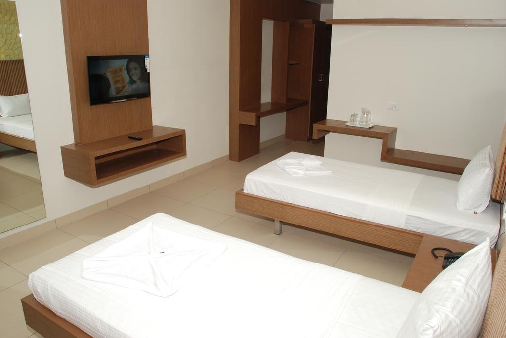 Hotel Pla Amrith Inn Tiruchirappalli Phòng bức ảnh